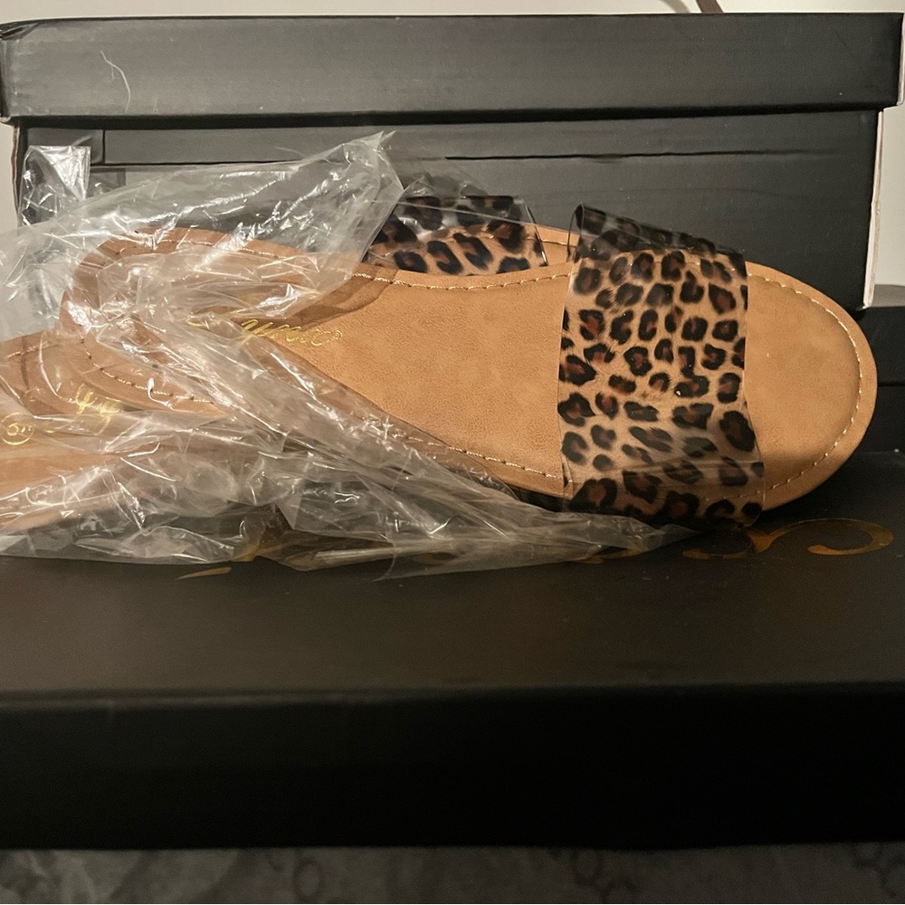 Clear, leopard flip-flops